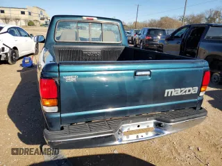 1997 Mazda B-Series 2WD Truck with VIN 4F4CR12A1VTM15033, listed as a Copart auction lot 84459434 with 143,764 mi miles and Salvage Title. Bid and sale history available at carsss.com. Image 6.