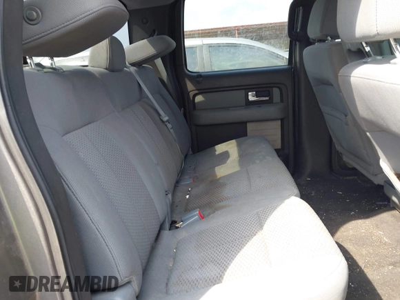 2014 Ford F-150 XL with VIN 1FTFW1CTXEKF35966, listed as a IAAI auction lot 42120360 with 140,174 mi miles and . Bid and sale history available at DreamBid. Image 8.