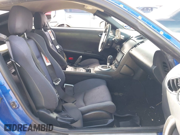 2005 Nissan 350Z Touring with VIN JN1AZ34D25M602913, listed as a IAAI auction lot 41692177 with 210,663 mi miles and . Bid and sale history available at DreamBid. Image 5.