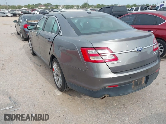 2014 Ford Taurus Limited with VIN 1FAHP2F81EG123902, listed as a IAAI auction lot 42345275 with 152,673 mi miles and . Bid and sale history available at DreamBid. Image 3.
