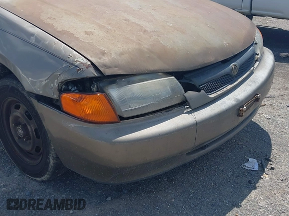 1997 Mazda Protege DX with VIN JM1BC1416V0132633, listed as a IAAI auction lot 42162630 with 234,300 mi miles and . Bid and sale history available at DreamBid. Image 6.