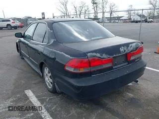 2002 Honda Accord SE z VIN 1HGCG66812A084949, wystawiony jako IAAI lot #42081536 z przebiegiem 309 920 mil mil oraz . Historia ofert i sprzedaży dostępna na DreamBid. Obrazek 3.