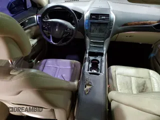2013 Lincoln MKZ z VIN 3LN6L2G9XDR824879, wystawiony jako Copart lot #44733705 z przebiegiem 147 652 mil mil oraz Szkody całkowita. Historia ofert i sprzedaży dostępna na DreamBid. Obrazek 8.