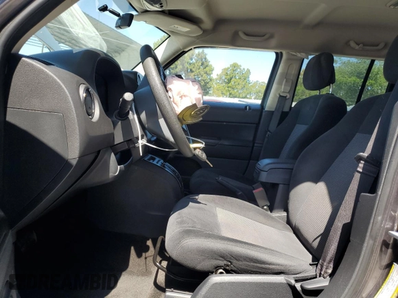 2014 Jeep Patriot Sport with VIN 1C4NJRBB7ED886081, listed as a Copart auction lot 52406205 with 61,002 mi miles and Salvage Title. Bid and sale history available at DreamBid. Image 7.