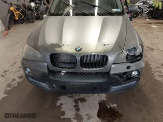 2009 BMW X5 30i with VIN 5UXFE43559L272922, listed as a IAAI auction lot 41723504 with 210,793 mi miles. Bid and sale history available at carsss.com. Image 6.