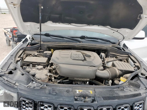 2021 Jeep Grand Cherokee Laredo X with VIN 1C4RJEAG4MC791070, listed as a Copart auction lot 61976435 with 30,963 mi miles and Salvage title. Bid and sale history available at DreamBid. Image 12.