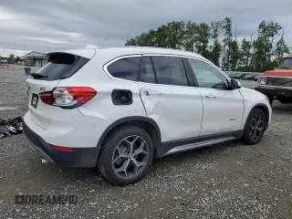 2016 BMW X1 xDrive28i z VIN WBXHT3C37GP882189, wystawiony jako Copart lot #56983985 z przebiegiem 45 700 mil mil oraz Szkoda całkowita • Salvage title. Historia ofert i sprzedaży dostępna na DreamBid. Obrazek 3.