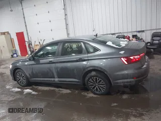 2021 Volkswagen Jetta S z VIN 3VWC57BU6MM001399, wystawiony jako IAAI lot #41488758 z przebiegiem 44 442 mil mil oraz . Historia ofert i sprzedaży dostępna na DreamBid. Obrazek 14.
