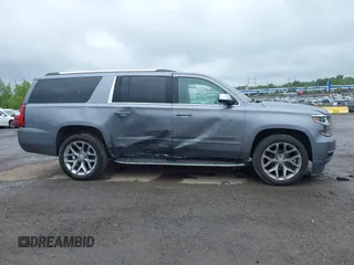 2019 Chevrolet Suburban Premier with VIN 1GNSKJKC9KR288722, listed as a IAAI auction lot 42282877 with 161,795 mi miles and . Bid and sale history available at DreamBid. Image 13.