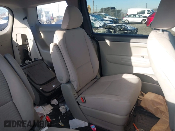 2019 Kia Sedona L with VIN KNDMA5C11K6539162, listed as a IAAI auction lot 41150477 with 76,847 mi miles. Bid and sale history available at carsss.com. Image 8.
