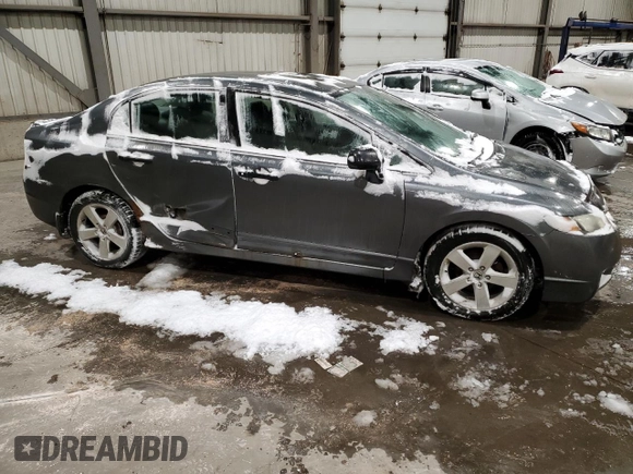 2010 Honda Civic z VIN 2HGFA1F25AH019647, wystawiony jako Copart lot #45129385 z przebiegiem 245 917 mil mil oraz Szkoda całkowita • Salvage title. Historia ofert i sprzedaży dostępna na DreamBid. Obrazek 4.
