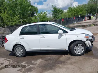 2010 Nissan Versa S with VIN 3N1BC1AP2AL409285, listed as a IAAI auction lot 42182721 with 266,855 mi miles and . Bid and sale history available at DreamBid. Image 13.