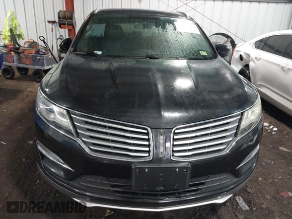 2015 Lincoln MKC with VIN 5LMCJ2A98FUJ17855, listed as a IAAI auction lot 41433416 with 113,070 mi miles. Bid and sale history available at carsss.com. Image 12.