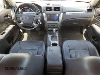 2011 Ford Fusion Hybrid с VIN 3FADP0L36BR251407, выставлен на аукционе Copart как лот 57838085 с пробегом 129 972 миль миль и Чистый • Clean title. История ставок и продаж доступна на DreamBid. Изображение 8.