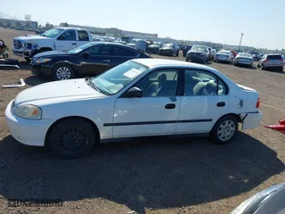 2000 Honda Civic LX with VIN 2HGEJ6673YH502410, listed as a IAAI auction lot 41992745 with 173,958 mi miles. Bid and sale history available at carsss.com. Image 14.