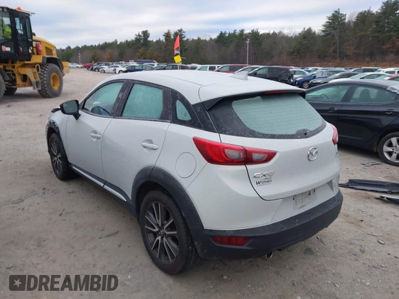 2016 Mazda CX-3 Grand Touring with VIN JM1DKFD7XG0132084, listed as a IAAI auction lot 41004954 with 70,476 mi miles. Bid and sale history available at carsss.com. Image 3.