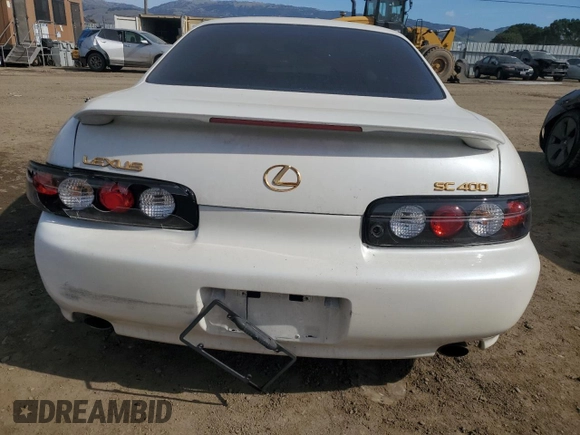 1998 Lexus SC 400 z VIN JT8CH32Y9W1001434, wystawiony jako Copart lot #44635385 z przebiegiem 125 440 mil mil oraz Szkoda całkowita • Salvage title. Historia ofert i sprzedaży dostępna na DreamBid. Obrazek 6.