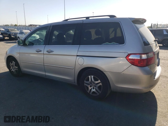 2005 Honda Odyssey EX-L with VIN 5FNRL38735B079366, listed as a Copart auction lot 53980645 with 241,156 mi miles and Salvage Title. Bid and sale history available at carsss.com. Image 2.