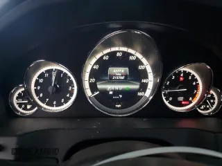 2013 Mercedes-Benz E 350 with VIN WDDKK5KF0DF214786, listed as a Copart auction lot 52063725 with 215,760 mi miles and Salvage title. Bid and sale history available at DreamBid. Image 9.