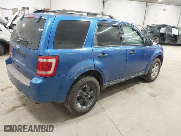 2012 Ford Escape XLT with VIN 1FMCU0D71CKC62090, listed as a IAAI auction lot 42635811 with 143,498 mi miles and . Bid and sale history available at DreamBid. Image 4.
