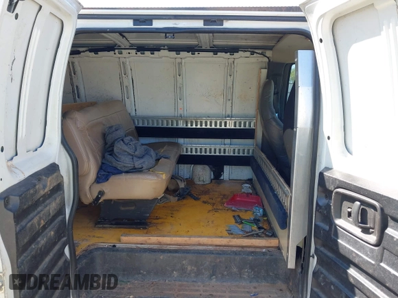 2009 Chevrolet Express Cargo Van with VIN 1GCGG25C791125061, listed as a IAAI auction lot 42131397 with 247,397 mi miles. Bid and sale history available at carsss.com. Image 8.