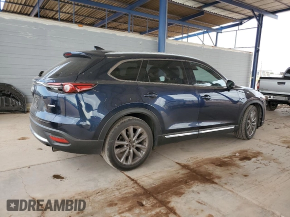 2021 Mazda CX-9 Carbon Edition z VIN JM3TCADY3M0513086, wystawiony jako Copart lot #53734925 z przebiegiem 92 744 mil mil oraz Szkoda całkowita • Salvage title. Historia ofert i sprzedaży dostępna na DreamBid. Obrazek 3.
