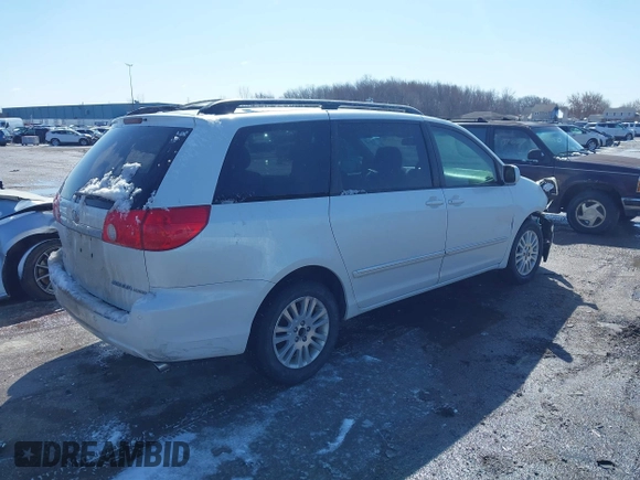 2008 Toyota Sienna XLE with VIN 5TDZK22C18S174818, listed as a IAAI auction lot 41906039 with 249,182 mi miles. Bid and sale history available at carsss.com. Image 4.