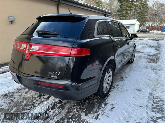 2019 Lincoln MKT with VIN 2LMHJ5NK1KBL00882, listed as a Copart auction lot 44974075 with 256,091 mi miles and Clean Title. Bid and sale history available at DreamBid. Image 4.