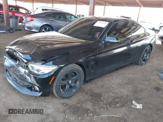 2015 BMW 4 Series 428i with VIN WBA3N3C55FK232613, listed as a IAAI auction lot 41865898 with 104,585 mi miles and . Bid and sale history available at carsss.com. Image 17.