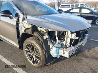 2021 Lexus RX with VIN 2T2SZMDA6MC307463, listed as a IAAI auction lot 40955402 with 7,308 mi miles. Bid and sale history available at carsss.com. Image 18.