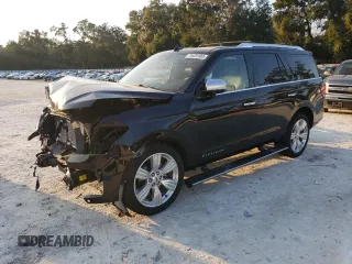 2023 Ford Expedition Platinum z VIN 1FMJU1L87PEA35787, wystawiony jako Copart lot #75626184 z przebiegiem 19 799 mil mil oraz Szkoda całkowita • Salvage title. Historia ofert i sprzedaży dostępna na DreamBid. Obrazek 1.