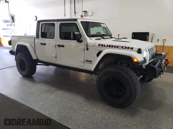 2020 Jeep Gladiator Rubicon with VIN 1C6JJTBG8LL121687, listed as a Copart auction lot 66404935 with 52,884 mi miles and Clean title. Bid and sale history available at DreamBid. Image 4.