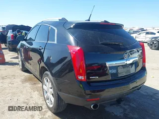 2014 Cadillac SRX Performance Collection z VIN 3GYFNCE35ES517868, wystawiony jako IAAI lot #41775522 z przebiegiem 166 960 mil mil oraz . Historia ofert i sprzedaży dostępna na DreamBid. Obrazek 3.