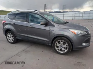 2014 Ford Escape Titanium with VIN 1FMCU9J97EUB30467, listed as a Copart auction lot 54949035 with 112,013 mi miles and Salvage Title. Bid and sale history available at DreamBid. Image 4.
