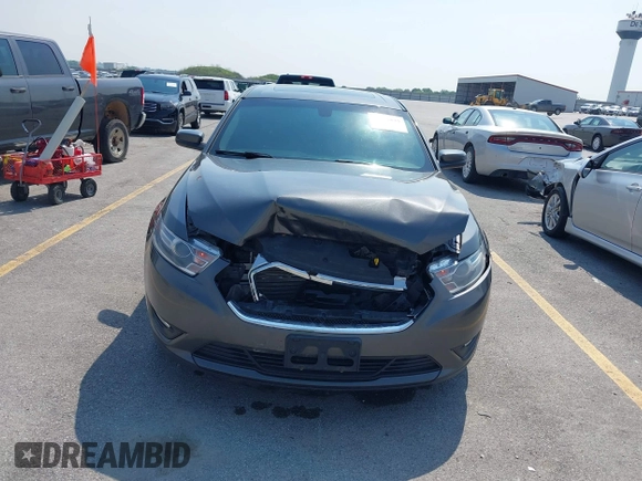 2015 Ford Taurus SEL with VIN 1FAHP2H81FG123199, listed as a IAAI auction lot 42431645 with 183,456 mi miles and . Bid and sale history available at DreamBid. Image 12.