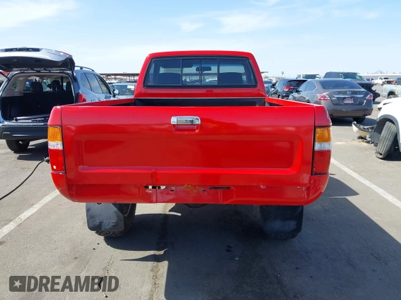 1990 Toyota Pickup DX z VIN JT4RN01P7L7019709, wystawiony jako IAAI lot #42448995 z przebiegiem 144 469 mil mil oraz . Historia ofert i sprzedaży dostępna na DreamBid. Obrazek 17.