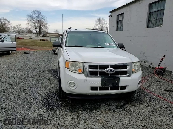 2012 Ford Escape XLT z VIN 1FMCU9DG9CKC69762, wystawiony jako Copart lot #49104075 z przebiegiem 92 937 mil mil oraz Szkoda całkowita • Salvage title. Historia ofert i sprzedaży dostępna na DreamBid. Obrazek 14.