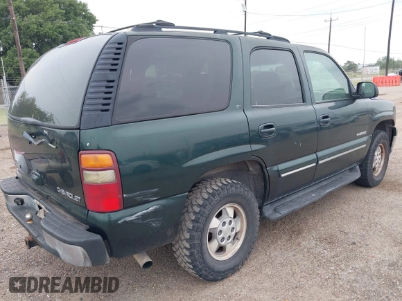 2002 Chevrolet Tahoe LT z VIN 1GNEC13ZX2R279380, wystawiony jako IAAI lot #42324646 z przebiegiem 188 781 mil mil oraz . Historia ofert i sprzedaży dostępna na DreamBid. Obrazek 4.