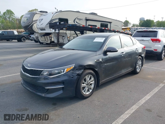 2016 Kia Optima LX with VIN KNAGT4L33G5107444, listed as a IAAI auction lot 41971006 with 174,997 mi miles. Bid and sale history available at carsss.com. Image 2.
