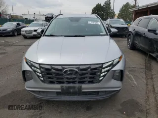 2022 Hyundai Tucson SEL with VIN 5NMJCCAE1NH034754, listed as a Copart auction lot 51097675 with 53,057 mi miles and Salvage Title. Bid and sale history available at carsss.com. Image 5.