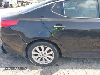 2014 Kia Optima EX with VIN 5XXGN4A70EG277871, listed as a IAAI auction lot 42183248 with 128,300 mi miles and . Bid and sale history available at carsss.com. Image 14.