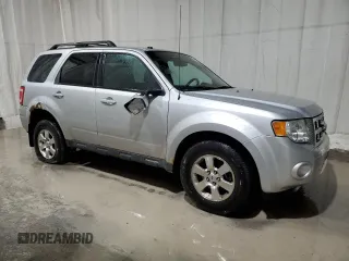 2010 Ford Escape Limited с VIN 1FMCU9EG1AKC84297, выставлен на аукционе Copart как лот 56038215 с пробегом 62 504 миль миль и Списание • Salvage title. История ставок и продаж доступна на DreamBid. Изображение 4.