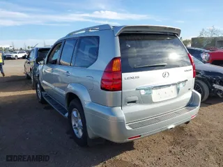2004 Lexus GX 470 with VIN JTJBT20X340025955, listed as a IAAI auction lot 41673289 with 106,701 mi miles. Bid and sale history available at carsss.com. Image 3.