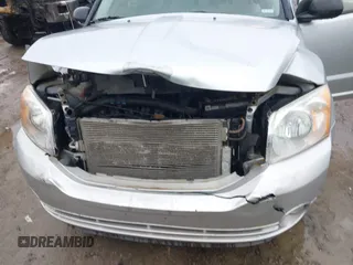 2011 Dodge Caliber Mainstreet with VIN 1B3CB3HA3BD234264, listed as a IAAI auction lot 41998567 with 132,687 mi miles and . Bid and sale history available at DreamBid. Image 6.