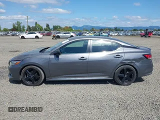 2022 Nissan Sentra SR with VIN 3N1AB8DV0NY319000, listed as a IAAI auction lot 42086935 with 52,701 mi miles. Bid and sale history available at carsss.com. Image 14.