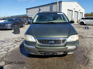 2002 Ford Windstar SEL with VIN 2FMDA53432BB05185, listed as a Copart auction lot 80389234 with 166,397 mi miles and Salvage title. Bid and sale history available at DreamBid. Image 5.