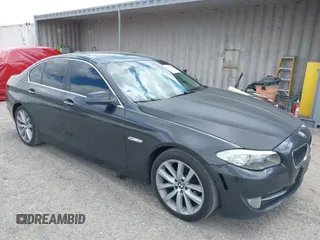 2012 BMW 5 Series 528i with VIN WBAXG5C52CDW24312, listed as a IAAI auction lot 42083257 with 94,798 mi miles. Bid and sale history available at carsss.com. Image 1.