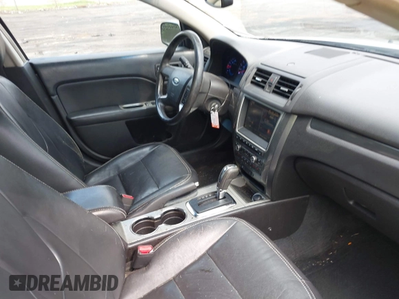2012 Ford Fusion SEL with VIN 3FAHP0JAXCR359565, listed as a IAAI auction lot 42609189 with 211,017 mi miles and . Bid and sale history available at DreamBid. Image 5.