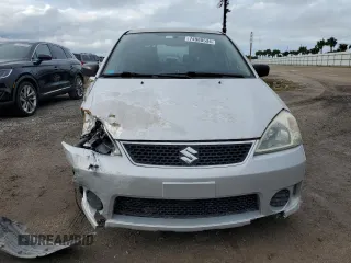 2006 Suzuki Aerio Premium z VIN JS2RC62H265351207, wystawiony jako Copart lot #74980534 z przebiegiem 64 199 mil mil oraz Nie do naprawy. Historia ofert i sprzedaży dostępna na DreamBid. Obrazek 5.