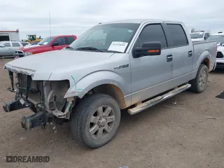 2013 Ford F-150 XL with VIN 1FTEW1CM9DKE10279, listed as a IAAI auction lot 41315691 with 148,668 mi miles. Bid and sale history available at carsss.com. Image 2.